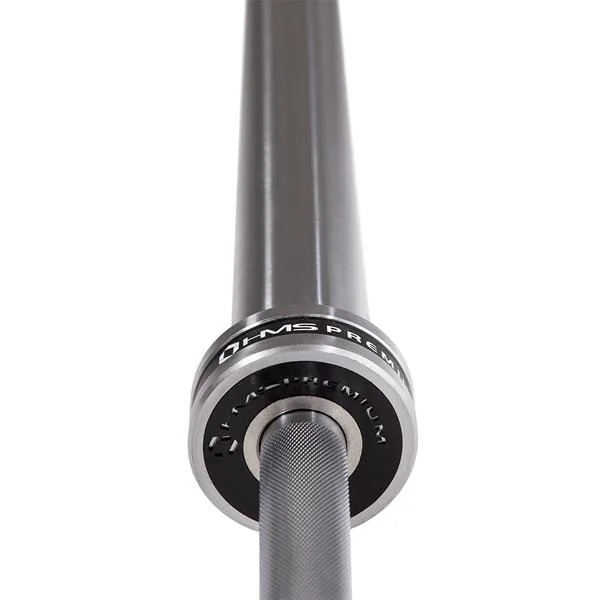 GO901 GRYF OLIMPIJSKI 20KG 2200MM HMS PREMIUM + ZG1500 SILVER ZACISKI LOCK JAW 3 GRYF OLIMPIJSKI PROSTY 20KG 2200MM PREMIUM + ZACISKI ZG1500 SILVER LOW JAW